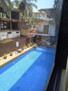 Hotel pleasure inn near turtle beach morjim Manage by ld group of hospitality