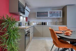 Appartements CHATEAU LAURIGA : photos des chambres
