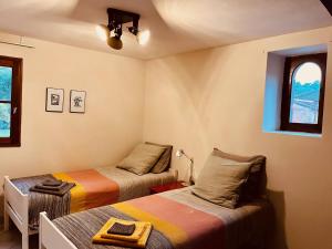 Appartements gite sivade - vue epique - grand jardin cloture : photos des chambres