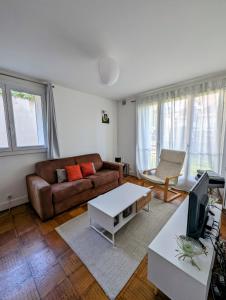 Appartements Magnifique T1 bis a proximite de Paris : photos des chambres
