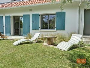 Maisons de vacances Les Pins : Rez de jardin proche plage : photos des chambres