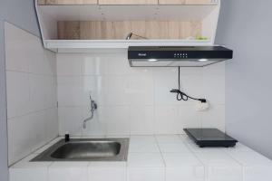 Homey 1BR Apartment at Newton Residence Bandung By Travelio