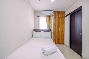 Homey and Modern Look Studio Apartment Atlanta Residences By Travelio