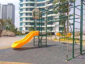 Minimalist Studio Grand Kamala Lagoon Apartment By Travelio