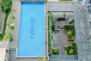 Minimalist Studio at Evenciio Margonda Apartment By Travelio
