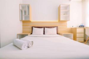 Homey and Well Design Studio Transpark Cibubur Apartment By Travelio