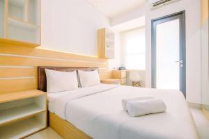 Homey and Well Design Studio Transpark Cibubur Apartment By Travelio