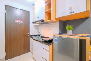 Minimalistic Look Studio Transpark Cibubur Apartment By Travelio