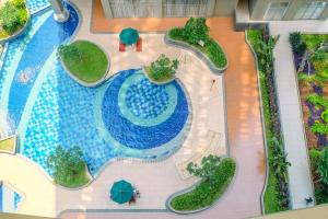 Minimalistic Look Studio Transpark Cibubur Apartment By Travelio