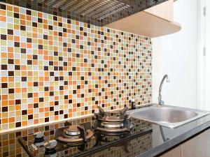 Great Deal Studio at Springlake Summarecon Bekasi Apartment By Travelio