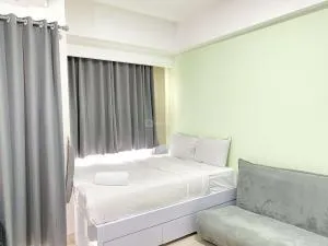 Good and Homey Studio at Gateway Park LRT City Bekasi Apartment By Travelio - Cibening Tiga