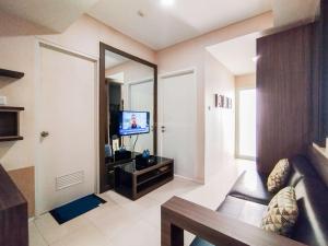 Minimalism Designed 1BR Apartment at Parahyangan Residence By Travelio