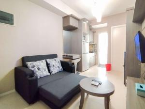 Delight 2BR Apartment at Parahyangan Residence By Travelio