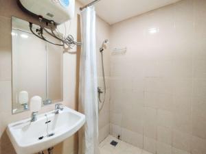 Minimalism Designed 1BR Apartment at Parahyangan Residence By Travelio