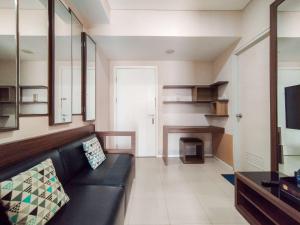 Minimalism Designed 1BR Apartment at Parahyangan Residence By Travelio