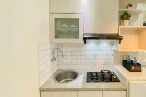Good Choice and Homey 2BR at Green Pramuka City Apartment By Travelio