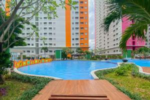 Good Choice and Homey 2BR at Green Pramuka City Apartment By Travelio