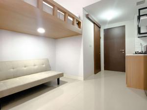 Restful and Well Designed Studio Transpark Juanda Bekasi Timur Apartment By Travelio