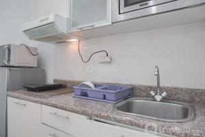 Cozy Stay and Tidy 1BR at The Bellezza Apartment By Travelio