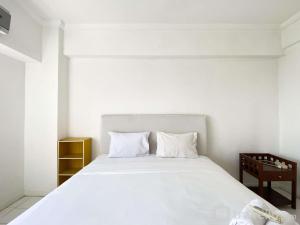 Comfort 2BR at Bona Vista Apartment By Travelio