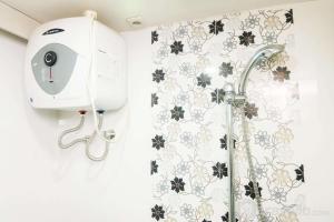 Posh 2BR Apartment at Bassura City near Shopping Mall By Travelio