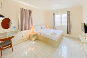 Restful and Cozy Studio Grand Palace Kemayoran Apartment By Travelio