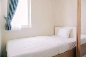 Gorgeous and Homey 2BR at Grand Palace Kemayoran Apartment By Travelio