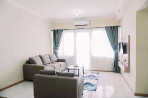 Gorgeous and Homey 2BR at Grand Palace Kemayoran Apartment By Travelio