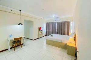 Good Studio (No Kitchen) Grand Palace Kemayoran Apartment By Travelio
