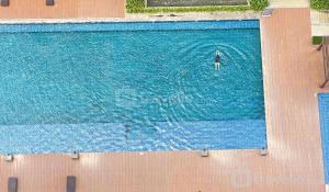 Nice and New 1BR with Office Room at Daan Mogot City Apartment By Travelio