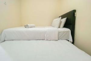Minimalist and Good Deal 2BR at Bassura City Apartment By Travelio