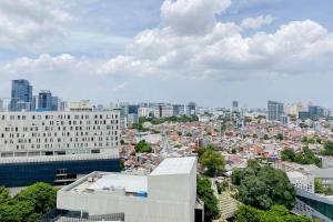 Modern Look Studio Room Menteng Park Apartment By Travelio