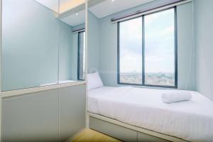 Comfort 2BR at Kebayoran Icon Apartment By Travelio