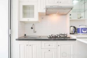 Restful 2BR Bassura City Apartment near Shopping Mall By Travelio