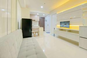 Brand New and Modern 2BR at Daan Mogot City Apartment By Travelio