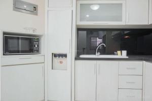 Comfy and Elegant 2BR at Sudirman Tower Condominium Apartment By Travelio