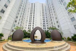 Best Strategic 2BR Apartment at Bassura City By Travelio