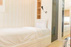 Nice and Homey 2BR Signature Park Grande Apartment By Travelio