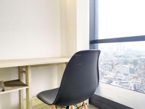 Elegant and Comfort 1BR Sudirman Suites Apartment By Travelio