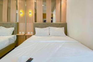 Good and Homey 1BR at Gold Coast Apartment By Travelio