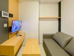 Good and Homey 1BR at Gold Coast Apartment By Travelio