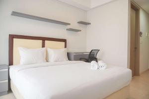 Minimalist and Nice Studio at Gold Coast Apartment By Travelio