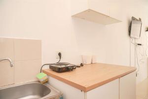 Best Choice and Homey Studio Tifolia Apartment By Travelio