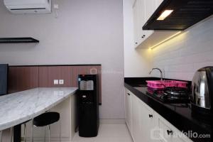 Nice and Strategic 1BR at Ciputra World 2 Apartment By Travelio
