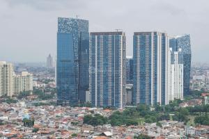 Amazing 1BR Apartment at The Wave Kuningan By Travelio