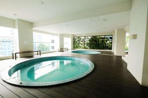 Great Location and Comfy 1BR Apartment at Capitol Park Residence By Travelio