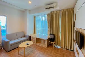 Great Location and Comfy 1BR Apartment at Capitol Park Residence By Travelio