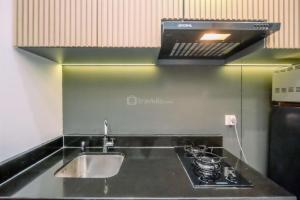 Minimalist and Comfy Studio Ciputra World 2 Apartment By Travelio