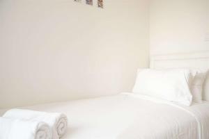 Well Furnished and Restful 2BR Tokyo Riverside PIK 2 Apartment By Travelio