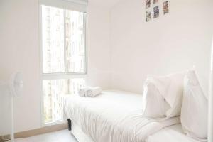 Well Furnished and Restful 2BR Tokyo Riverside PIK 2 Apartment By Travelio